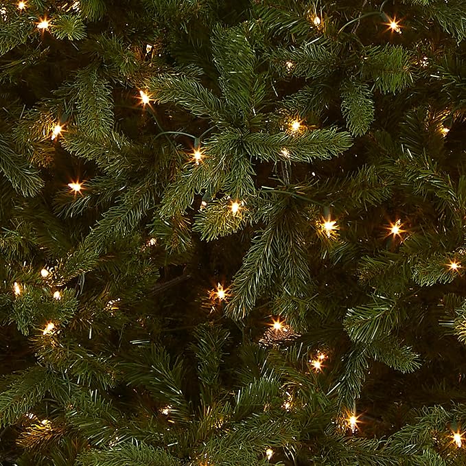 National Tree Company Pre-lit 'Feel Real' Artificial Giant Downswept Christmas Tree, Green, Douglas Fir, White Lights, Includes Stand, 10 feet